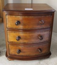 A mahogany & banded table top bow fronted set of three small drawers