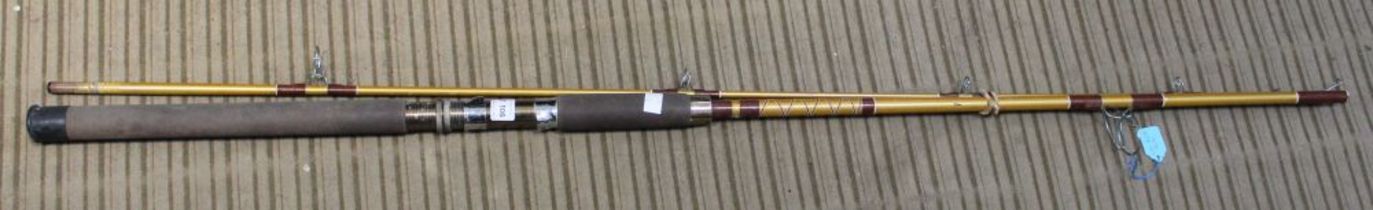 A vintage 2-piece 8 ft fibreglass spinning rod "Olympic"