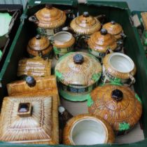 A quantity of Beswick cottage ware, includes teapots, jugs, biscuit barrel etc