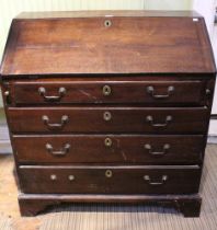 Possibly late Georgian bureau, four drawers and a drop down slope on bracket feet