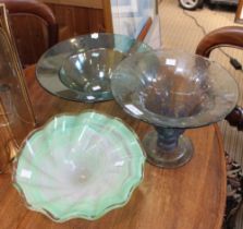 Three examples of studio glass bowls