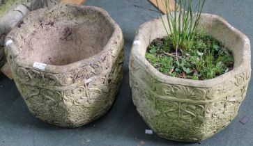 A pair of cast garden octagonal planters