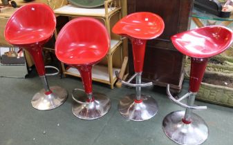 Four red plastic bar stools with chrome stand and adjustable base, one a/f