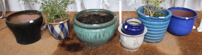 Seven glazed ceramic garden pots various