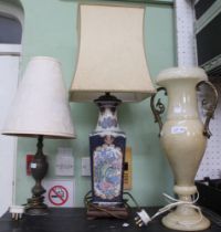 An Oriental blue and white lamp base with two other examples