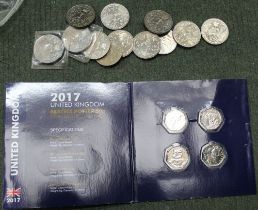 Twelve 1977 Jubilee coins and four 2017 UK Beatrix Potter 50p coins
