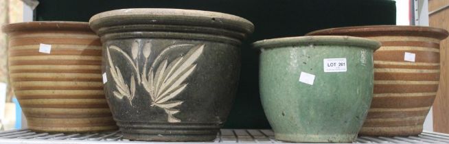 Four glazed terracotta garden pots