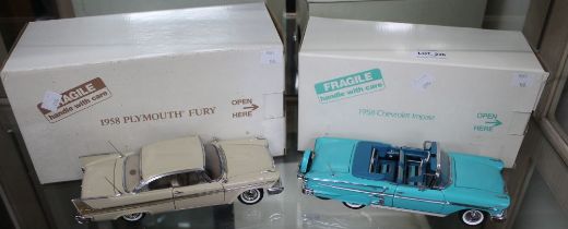 Two Danbury Mint model cars, a 1958 Chevrolet Impala and a 1958 Plymouth Fury (2)
