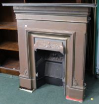 A modern cast iron art nouveau style fireplace with back