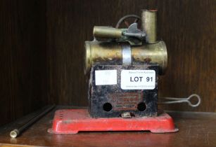 A vintage Mamod brass and tin stationary steam engine