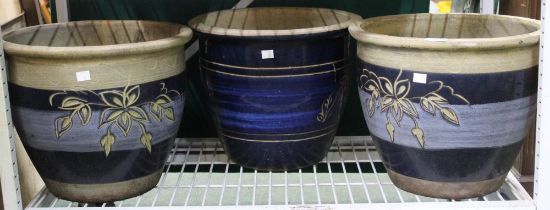Three large blue glazed ceramic garden pots
