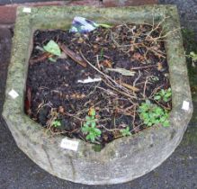 A cast garden trough planter
