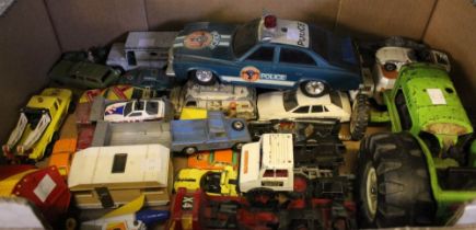 A tray box containing a good selection of play worn die-cast vehicles etc