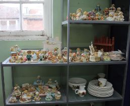 A large quantity of ceramic teddy bear figures including display stands certificates etc