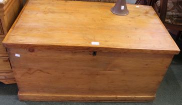 A late 19th century pine blanket box with an internal hidden drawer