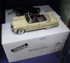 Two Danbury Mint model cars, a 1949 Ford Custom and a 1925 Ford Model T Runabout (2)