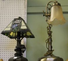 Two table lamps, one with a Tiffany style shade the other a glass drop shade