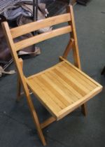 Five modern hard wood folding chairs