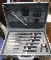 Prima - A set of knives and BBQ tools in metal carry case unused as new