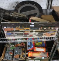 A quantity of Hornby track and turntable with a large selection of scenery, buildings etc