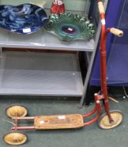 A vintage Triang child's scooter
