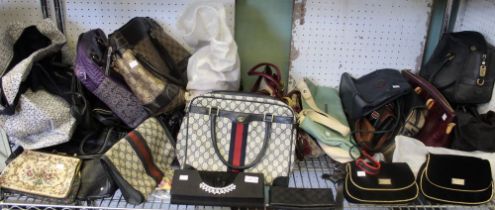 A large quantity of handbags, clutch bags and purses etc