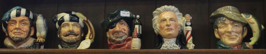 A collection of five Royal Doulton Character jugs, includes The Poacher, Mozart, The Trapper, The Fa