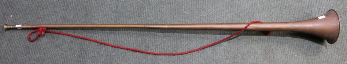 A large copper coaching horn