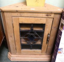 An old pine wall hanging Corner Cupboard with leaded stain glass door