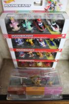 Five original boxed Hot Wheels sets, includes four MarioKart and one Disney Racer Verse (5)