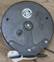 A vintage "Strike Right" centre pin reel