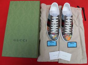 A pair of Gucci Donald Duck trainers, boxed, size 71/2