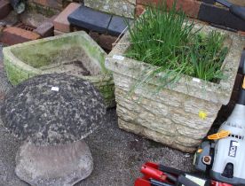 A cast square garden planter, together with a corner planter and a staddle stone