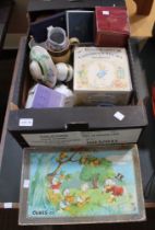 A box containing a selection of useful and collectible items, children's games Wedgwood etc