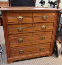 An Edwardian satinwood two over three drawers, in need of restoration