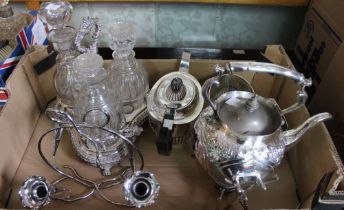 A quantity of silver plated wares, includes a three piece tea set, spirit kettle on stand, epergne a