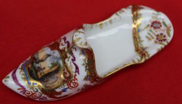 A 19th century Meissen slipper, Eastern form with pointed toe and trodden down heel, richly painted