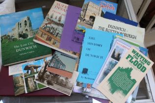 A collection of books and leaflets relating to the lost city of Dunwich and other Southwold memorabi