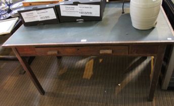 A mid century office desk with leatherette cover and single drawer