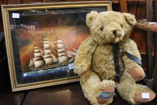 A plush teddy bear, with label "The Traditional Bear Collection" together with a 3-D framed picture