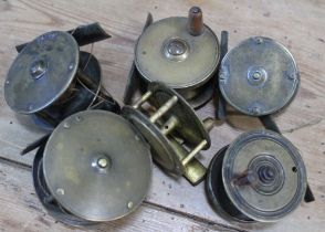 Six vintage small brass centre pin reels