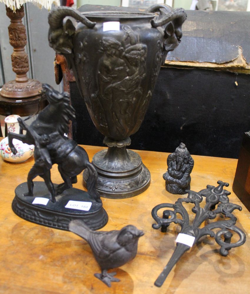 A Continental, Art Nouveau design spelter vase, with mask handles, 32cm high, together with a spelte