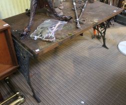 A low garden table on cast iron legs