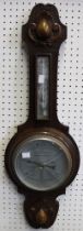 A vintage banjo wooden barometer
