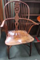 An early 19th century Windsor double cone-back Yew wood and Elm seated chair