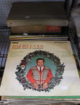 A large selection of vinyl long play records and an assortment of 78's