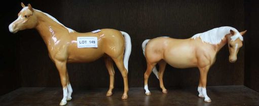 Two Beswick porcelain light brown horses