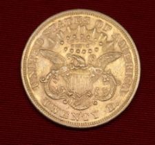 A gold 1873 United States of America Twenty Dollar coin