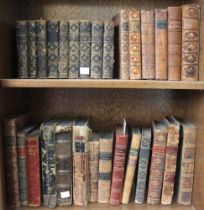 A quantity of leather bound books for decoration including odd volumes etc (29)
