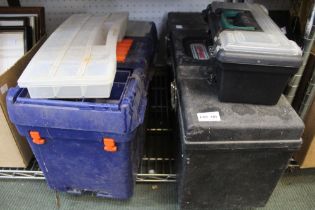 Four tool boxes containing a very small quantity of tools